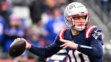 Jan 5, 2025; Foxborough, Massachusetts, USA; New England Patriots quarterback Drake Maye (10) looks to throw against the Buffalo Bills during the first half at Gillette Stadium. Mandatory Credit: Brian Fluharty-Imagn Images