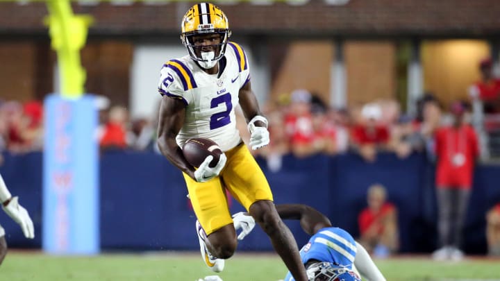 Sep 30, 2023; Oxford, Mississippi, USA; LSU Tigers wide receiver Kyren Lacy (2) runs after a catch during the second half against the Mississippi Rebels at Vaught-Hemingway Stadium. Mandatory Credit: Petre Thomas-USA TODAY Sports