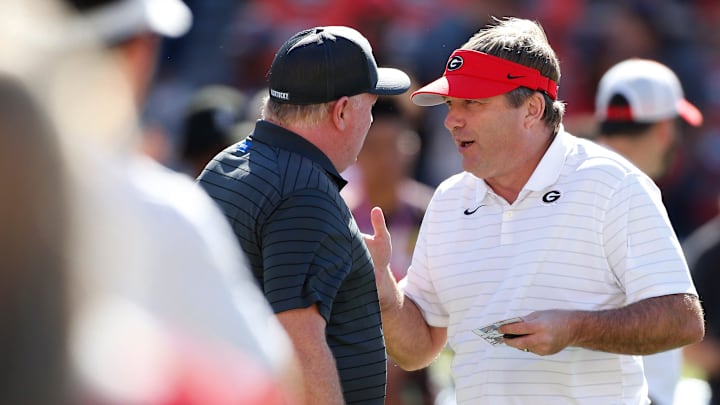 Georgia coach Kirby Smart speaks with Kentucky coach Mark Stoops before an NCAA college football game between Kentucky and Georgia in Athens, Ga., on Saturday, Oct. 16, 2021.

News Joshua L Jones