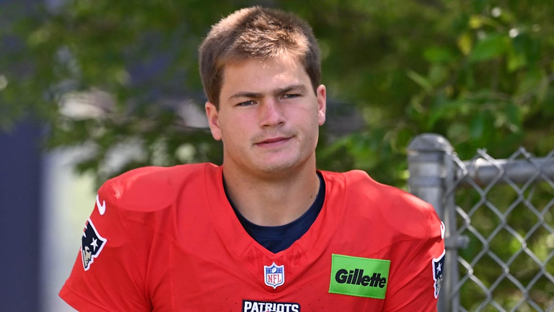 Jul 28, 2025; Foxborough, MA, USA; New England Patriots quarterback Drake Maye (10) heads to the practice fields for training camp at Gillette Stadium. Mandatory Credit: Eric Canha-Imagn Images