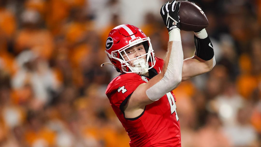 Nov 16, 2024; Athens, Georgia, USA; Georgia Bulldogs tight end Oscar Delp (4) catches a ball for a touchdown against the Tennessee Volunteers in the second quarter at Sanford Stadium. Mandatory Credit: Brett Davis-Imagn Images
