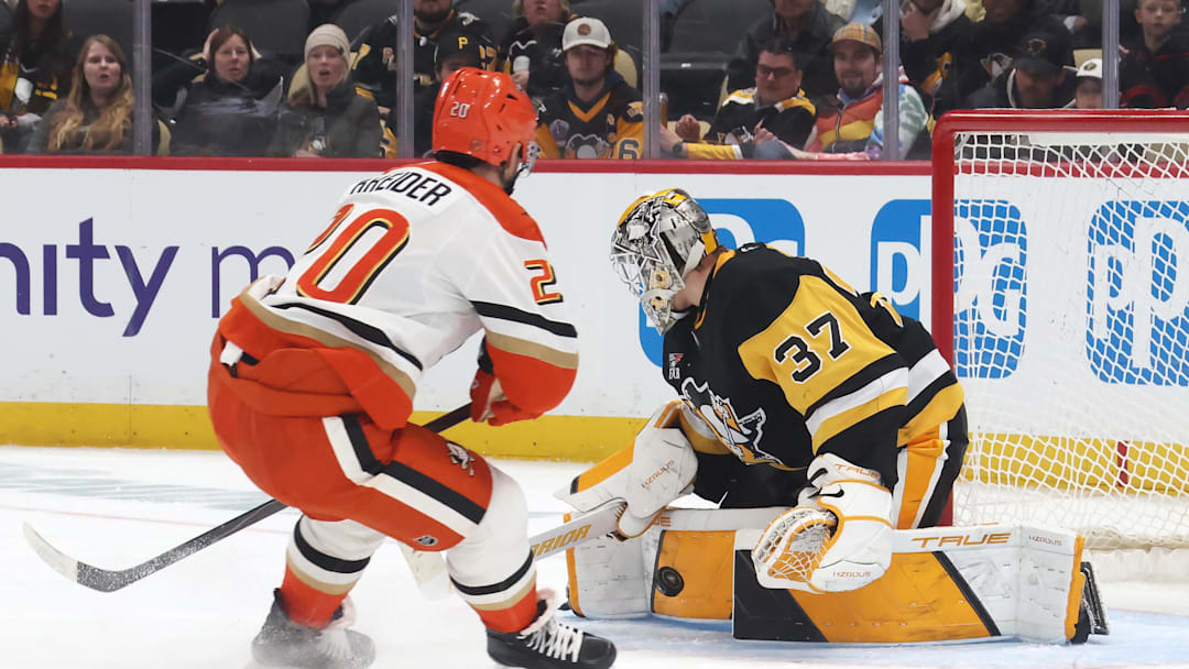 Dec 9, 2025; Pittsburgh, Pennsylvania, USA;  Pittsburgh Penguins goaltender Arturs Silovs (37) makes a save against Anaheim Ducks left wing Chris Kreider (20) during the second period at PPG Paints Arena. Mandatory Credit: Charles LeClaire-Imagn Images