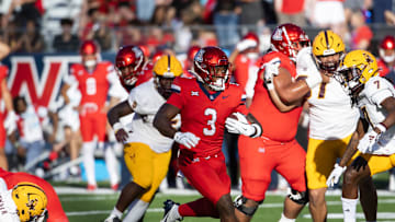 Nov 30, 2024; Tucson, Arizona, USA; Arizona Wildcats running back Kedrick Reescano (3) against the Arizona State Sun Devils during the Territorial Cup at Arizona Stadium. Mandatory Credit: Mark J. Rebilas-Imagn Images