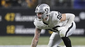 Dec 24, 2022; Pittsburgh, Pennsylvania, USA;  Las Vegas Raiders defensive end Maxx Crosby (98) at the line of scrimmage against the Pittsburgh Steelers during the third quarter at Acrisure Stadium. The Steelers won 13-10. Mandatory Credit: Charles LeClaire-Imagn Images