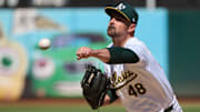 Sep 7, 2024; Oakland, California, USA; Oakland Athletics pitcher T.J. McFarland (48) throws a pitch against the Detroit Tigers during the seventh inning at Oakland-Alameda County Coliseum. Mandatory Credit: Robert Edwards-Imagn Images