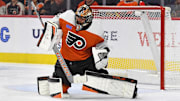 Oct 22, 2024; Philadelphia, Pennsylvania, USA; Philadelphia Flyers goaltender Samuel Ersson (33) makes a save against the Washington Capitals during the first period at Wells Fargo Center. Mandatory Credit: Eric Hartline-Imagn Images