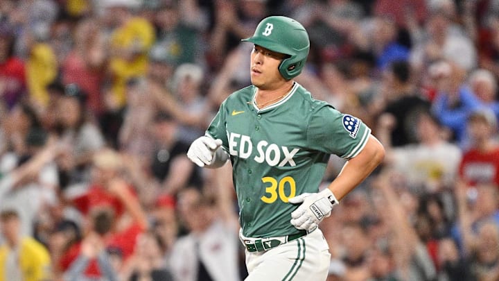 May 16, 2025; Boston, Massachusetts, USA; Boston Red Sox right fielder Rob Refsnyder (30) runs the bases after hitting a home run against the Atlanta Braves during the seventh inning at Fenway Park.