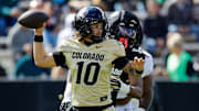 Apr 19, 2025; Boulder, CO, USA; Colorado Buffaloes quarterback Julian Lewis (10) and defensive end Arden Walker (53) during the spring game at Folsom Field. 