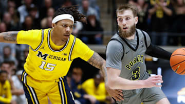 Michigan Wolverines guard Rubin Jones (15) defends Purdue Boilermakers guard Braden Smith (3) Friday, Jan. 24, 2025, during the NCAA men’s basketball game at Mackey Arena in West Lafayette, Ind. Purdue Boilermakers won 91-64.