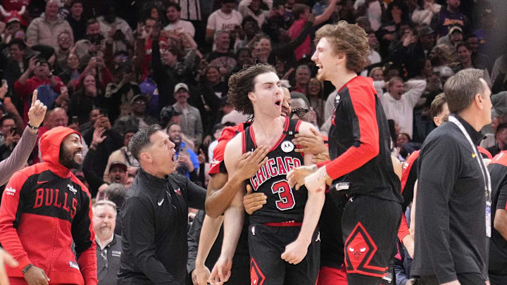 Mar 27, 2025; Chicago, Illinois, USA; Chicago Bulls guard Josh Giddey (3) celebrates with teammates after making the game-winning three point basket against the Los Angeles Lakers during the second half at United Center. Mandatory Credit: David Banks-Imagn Images
