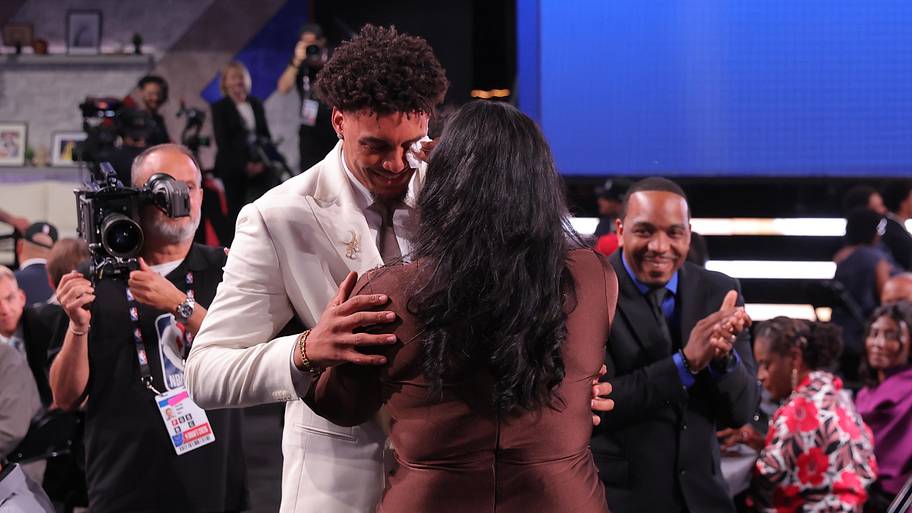 The No. 11 pick in the 2026 NBA draft, Michigan’s Yaxel Lendeborg reacts after he was drafted by the Golden State Warriors.