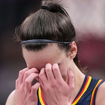 Indiana Fever guard Caitlin Clark (22) rubs her face in disappointment Wednesday, Sept. 4, 2024, during the game at Gainbridge Fieldhouse in Indianapolis. The Indiana Fever defeated the Los Angeles Sparks, 93-86.