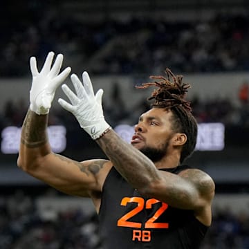 Mar 1, 2025; Indianapolis, IN, USA; Miami running back Damien Martinez (RB22) during the 2025 NFL Combine at Lucas Oil Stadium.