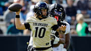 Apr 19, 2025; Boulder, CO, USA; Colorado Buffaloes quarterback Julian Lewis (10) and defensive end Arden Walker (53) during the spring game at Folsom Field. 
