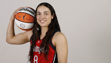 Apr 28, 2025; Washington, DC, USA; Washington Mystics guard Georgia Amoore (8) poses for a portrait during Mystics Media Day at CareFirst Arena. Mandatory Credit: Geoff Burke-Imagn Images