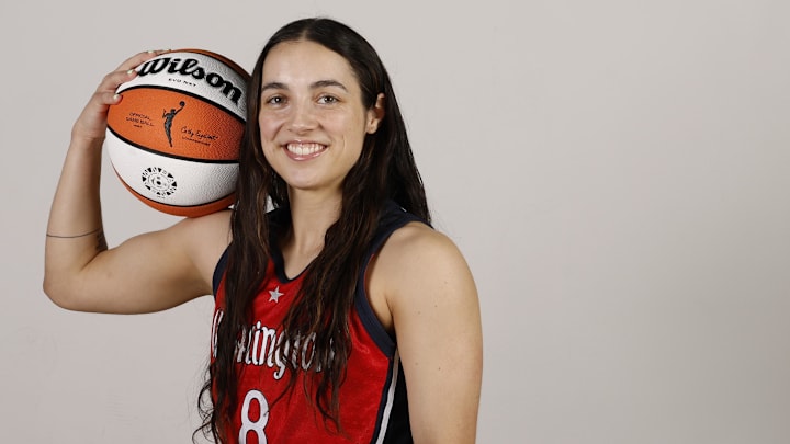 Apr 28, 2025; Washington, DC, USA; Washington Mystics guard Georgia Amoore (8) poses for a portrait during Mystics Media Day at CareFirst Arena. Mandatory Credit: Geoff Burke-Imagn Images