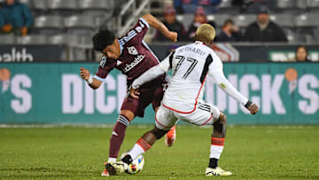 Apr 20, 2024; Commerce City, Colorado, USA; Colorado Rapids midfielder Omir Fernandez (11) and FC Dallas forward Bernard Kamungo (77) fight for the ball during the second half at Dick's Sporting Goods Park. Mandatory Credit: Christopher Hanewinckel-USA TODAY Sports