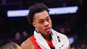 Toronto Raptors forward Scottie Barnes (4) does an interview after a victory over the Atlanta Hawks at State Farm Arena.