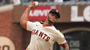 Apr 24, 2025; San Francisco, California, USA; San Francisco Giants relief pitcher Camilo Doval (75) pitches the ball against the Milwaukee Brewers during the ninth inning at Oracle Park.