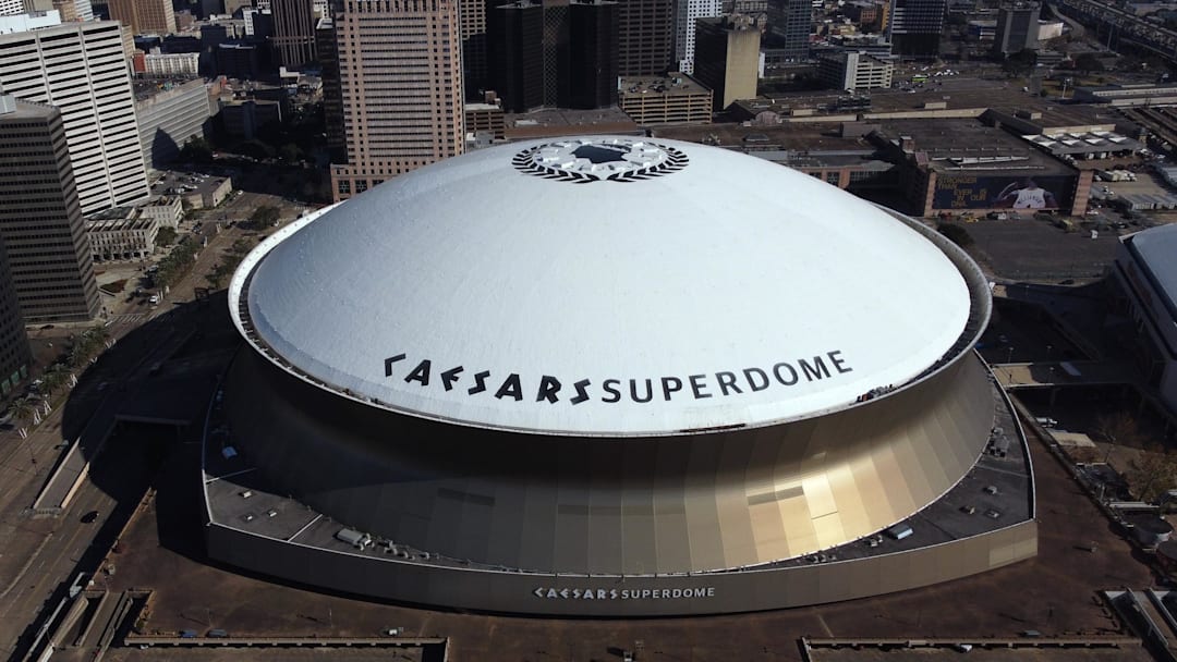 Feb 14, 2022; New Orleans, Louisiana, USA;  Detailed view of the Caesars Superdome and Smoothie King Center from outside before the game between the Toronto Raptors at New Orleans Pelicans at the Smoothie King Center.