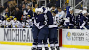 The Penn State Nittany Lions celebrate a goal in the second period against Michigan in the Big Ten Hockey Tournament. 