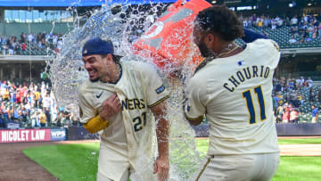 Sep 2, 2024; Milwaukee, Wisconsin, USA;  Milwaukee Brewers shortstop Willy Adames (27) is dunked by Milwaukee Brewers left fielder Jackson Chourio (11) after beating the St. Louis Cardinals at American Family Field. Mandatory Credit: Benny Sieu-USA TODAY Sports