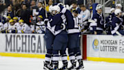 The Penn State Nittany Lions celebrate a goal vs. the Michigan Wolverines in the Big Ten Men's Hockey Tournament.