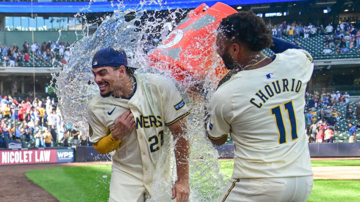 Sep 2, 2024; Milwaukee, Wisconsin, USA;  Milwaukee Brewers shortstop Willy Adames (27) is dunked by Milwaukee Brewers left fielder Jackson Chourio (11) after beating the St. Louis Cardinals at American Family Field.