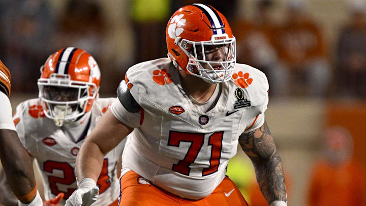 Dec 21, 2024; Austin, Texas, USA; Clemson Tigers offensive lineman Tristan Leigh (71) in action during the game between the Texas Longhorns and the Clemson Tigers in the CFP National Playoff First Round at Darrell K Royal-Texas Memorial Stadium. Mandatory Credit: Jerome Miron-Imagn Images