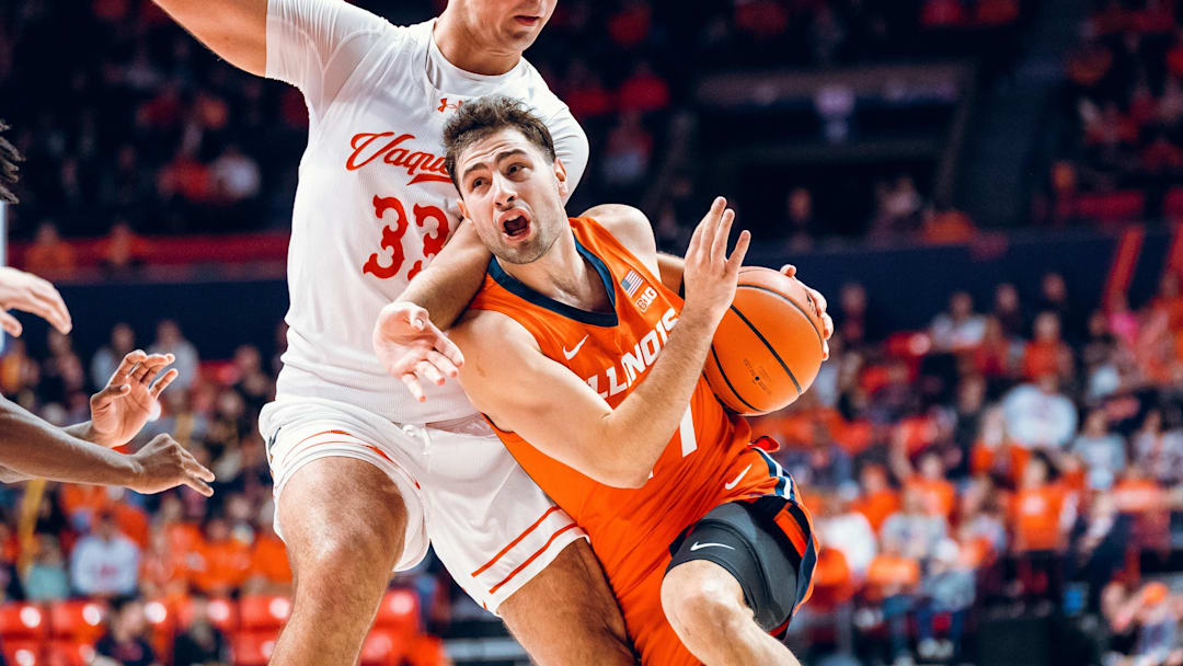 Illinois guard Mihailo Petrovic (77) drives by a UT Rio Grande Valley defender in the Illini's win over the Vaqueros last week at the State Farm Center in Champaign, Illinois.