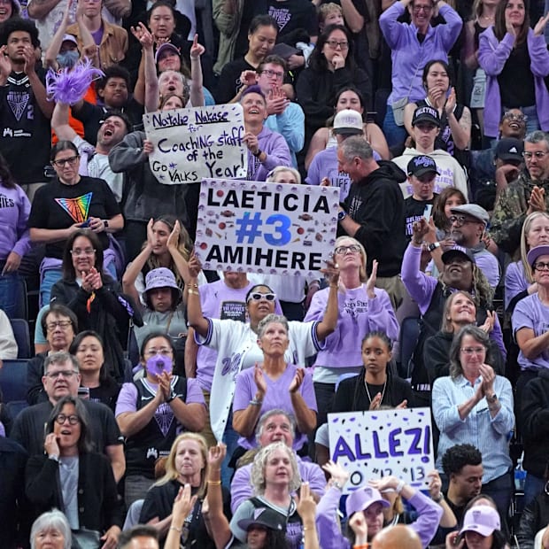 Golden State Valkyries fans cheer during a game. 