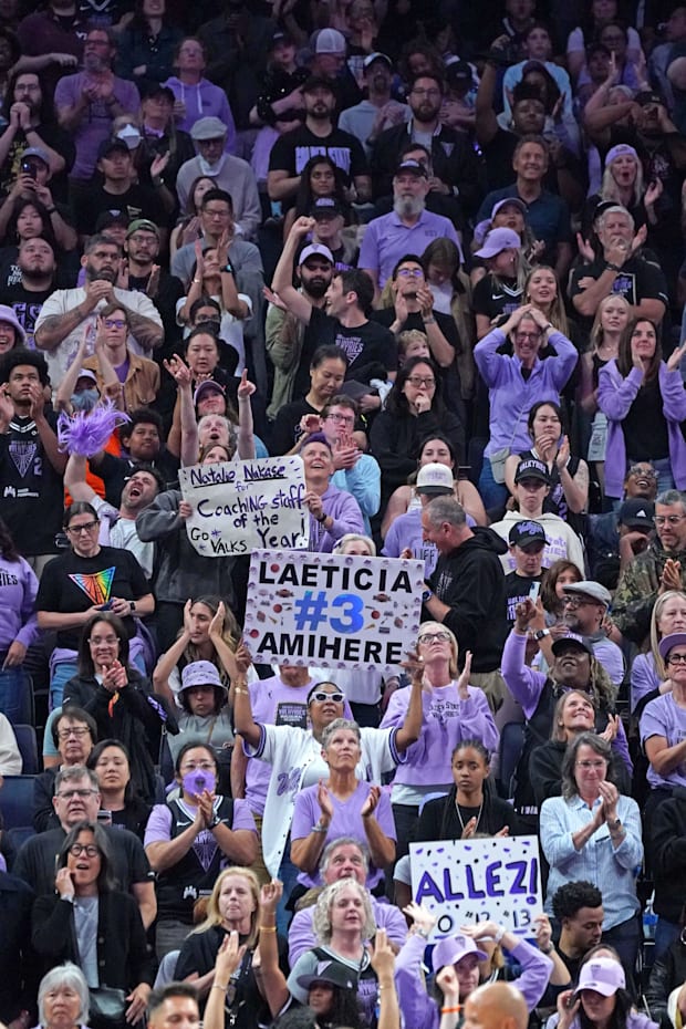 Golden State Valkyries fans cheer during a game. 
