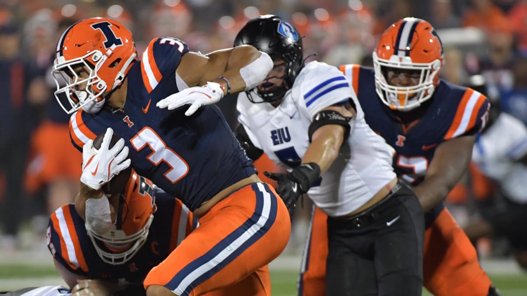 Aug 29, 2024; Champaign, Illinois, USA;  Illinois Fighting Illini running back Kaden Feagin (3) carries the ball against the Eastern Illinois Panthers during the first half at Memorial Stadium. Mandatory Credit: Ron Johnson-USA TODAY Sports