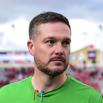 Oct 28, 2023; Salt Lake City, Utah, USA; Oregon Ducks head coach Dan Lanning congratulates players after defeating the Utah Utes at Rice-Eccles Stadium. 