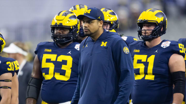 Dec 31, 2022; Glendale, Arizona, USA; Michigan Wolverines tight ends coach Grant Newsome against the TCU Horned Frogs during the 2022 Fiesta Bowl at State Farm Stadium. Mandatory Credit: Mark J. Rebilas-USA TODAY Sports