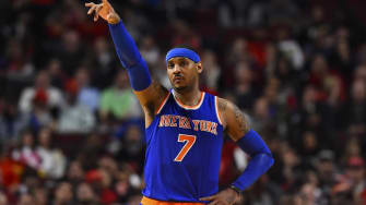 Mar 23, 2016; Chicago, IL, USA; New York Knicks forward Carmelo Anthony (7) reacts after a basket