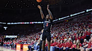 Feb 15, 2025; Ames, Iowa, USA; Cincinnati Bearcats guard Jizzle James (2) shoots against the Iowa State Cyclones during the second half at James H. Hilton Coliseum. Mandatory Credit: Reese Strickland-Imagn Images
