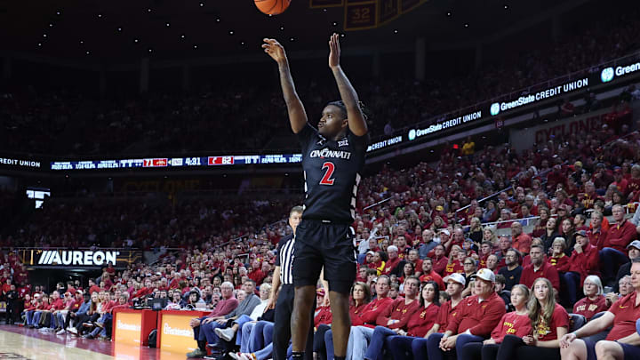 Feb 15, 2025; Ames, Iowa, USA; Cincinnati Bearcats guard Jizzle James (2) shoots against the Iowa State Cyclones during the second half at James H. Hilton Coliseum. Mandatory Credit: Reese Strickland-Imagn Images Feb 15, 2025; Ames, Iowa, USA; Cincinnati Bearcats guard Jizzle James (2) shoots against the Iowa State Cyclones during the second half at James H. Hilton Coliseum. Mandatory Credit: Reese Strickland-Imagn Images
