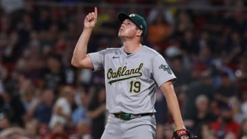 Jul 10, 2024; Boston, Massachusetts, USA; Oakland Athletics relief pitcher Mason Miller (19) reacts after defeating the Boston Red Sox at Fenway Park. Mandatory Credit: Paul Rutherford-USA TODAY Sports