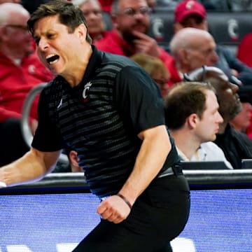 Wes Miller reacts to a play in the second half of a NCAA men’s basketball game between the Cincinnati Bearcats and Kansas State Wildcats, Wednesday, March 5, 2025, at Fifth Third Arena in Cincinnati. Wildcats won 54-49.