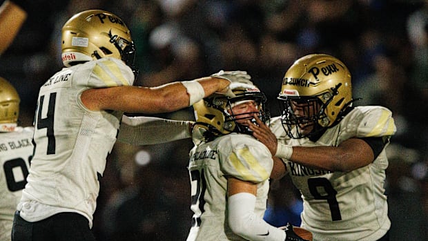 Penn's Colden Hernandez (21) celebrates a forced turnover versus Mishawaka in 2024.