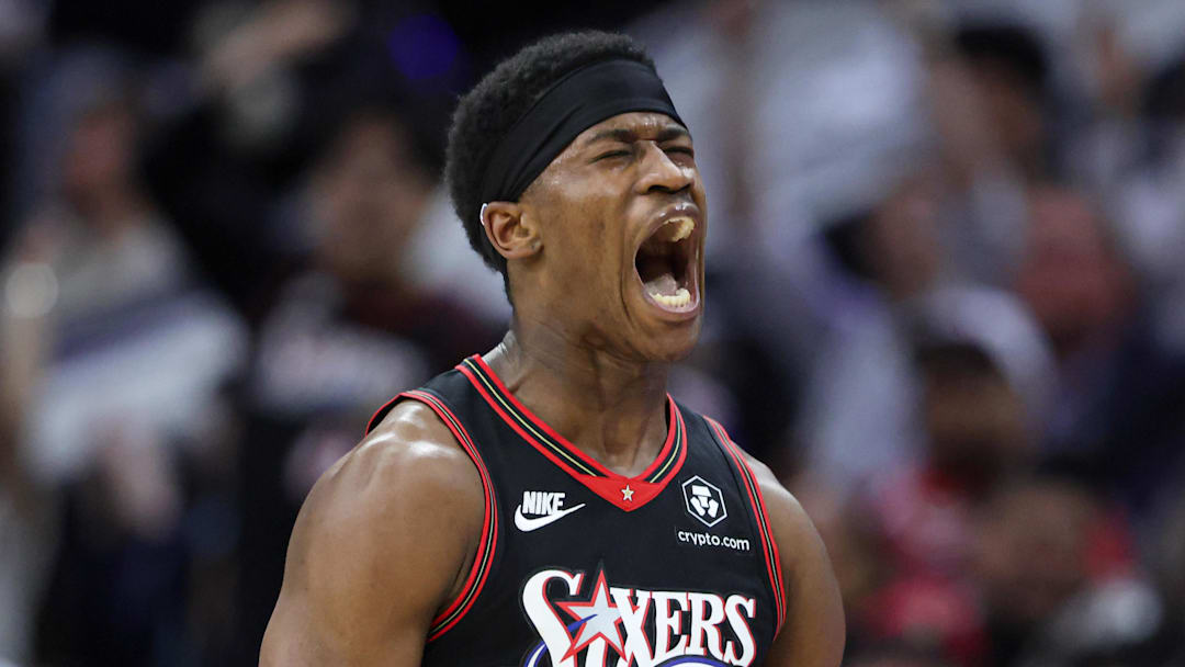 Philadelphia 76ers guard VJ Edgecombe (77) reacts after his three-pointer against the Oklahoma City Thunder during the fourth quarter at Xfinity Mobile Arena on March 23, 2026.