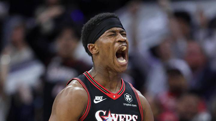 Philadelphia 76ers guard VJ Edgecombe (77) reacts after his three-pointer against the Oklahoma City Thunder during the fourth quarter at Xfinity Mobile Arena on March 23, 2026.