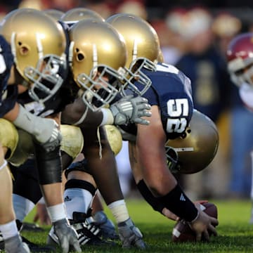 Oct 17, 2009; South Bend, IN, USA; Southern California Trojans and Notre Dame Fighting Irish players line up at the line of scrimmage during the game at Notre Dame Stadium. USC defeated Notre Dame 34-27.