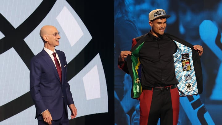 Jun 26, 2024; Brooklyn, NY, USA; Tristan da Silva reacts with NBA commissioner Adam Silver after being selected in the first round by the Orlando Magic in the 2024 NBA Draft 