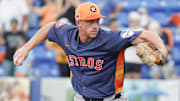 Mar 16, 2025; Port St. Lucie, Florida, USA;  Houston Astros pitcher Logan VanWey throws a pitch during the seventh inning against the New York Mets at Clover Park. 