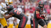 Oklahoma quarterback John Mateer carries the ball in the Sooners' win over Missouri.