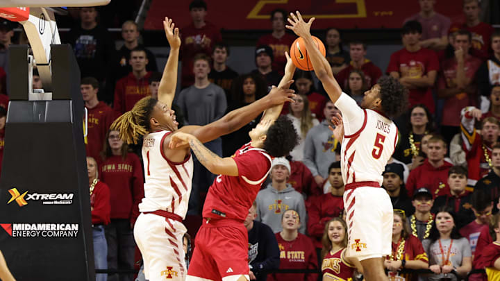 Nov 18, 2024; Ames, Iowa, USA;  During the first half IUPUI Jaguars forward DeSean Goode (2) has his shot blocked by Iowa State Cyclones guard Curtis Jones (5) at James H. Hilton Coliseum. Mandatory Credit: Reese Strickland-Imagn Images