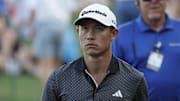 Collin Morikawa, not looking happy