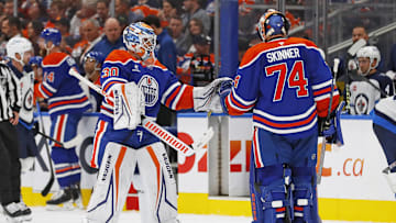 Edmonton Oilers goaltender Calvin Pickard (30) replaces goaltender Stuart Skinner (74) after he gave up 5 goals on 13 shots against the Winnipeg Jets